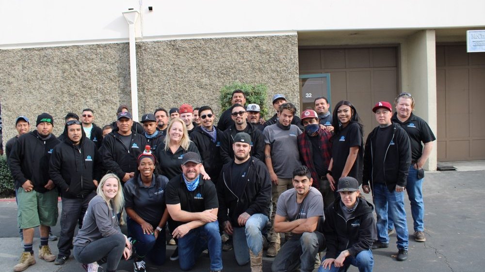 The Professional Drainage Experts crew posing together